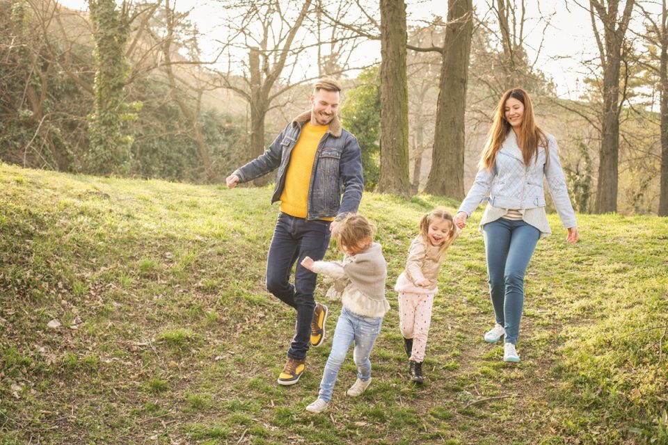 family running in the woods