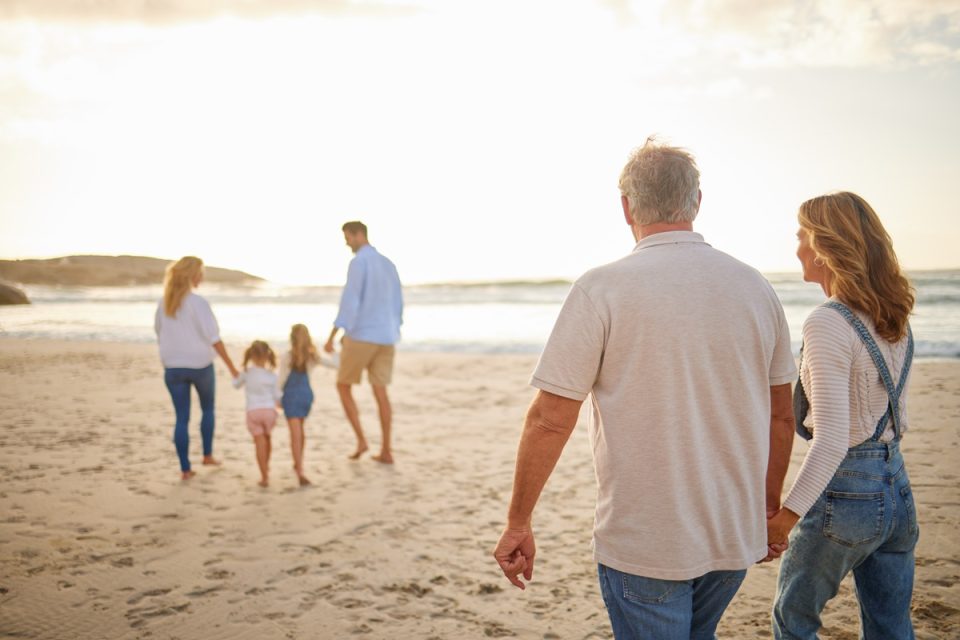 Family walking on the beach