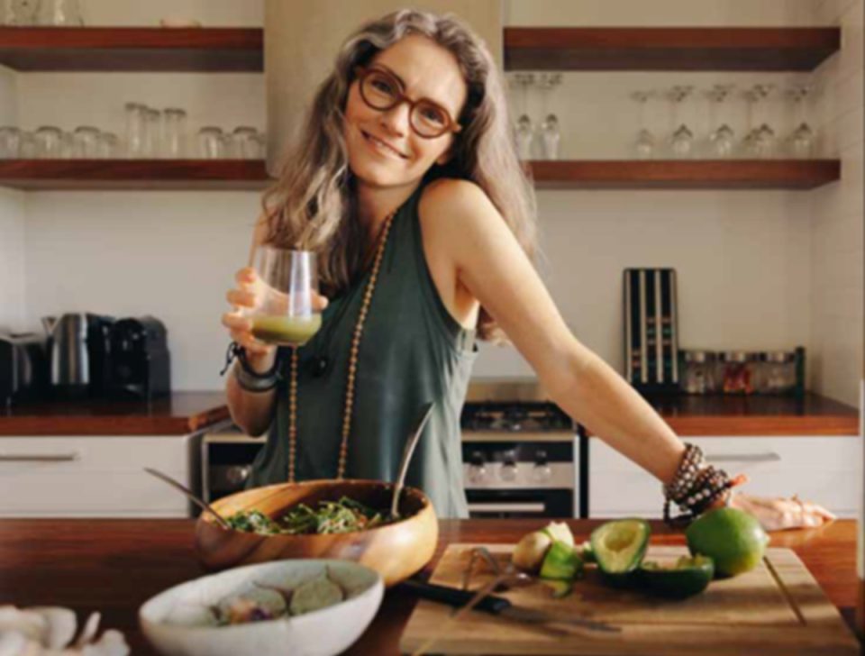 Woman smiling in kitchen
